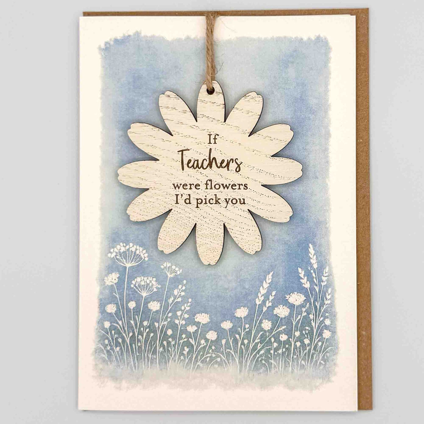 If teachers were flowers keepsake card from Sprinkled with Magic, featuring a removable wooden flower keepsake, blue botanical design and recycled kraft envelope.