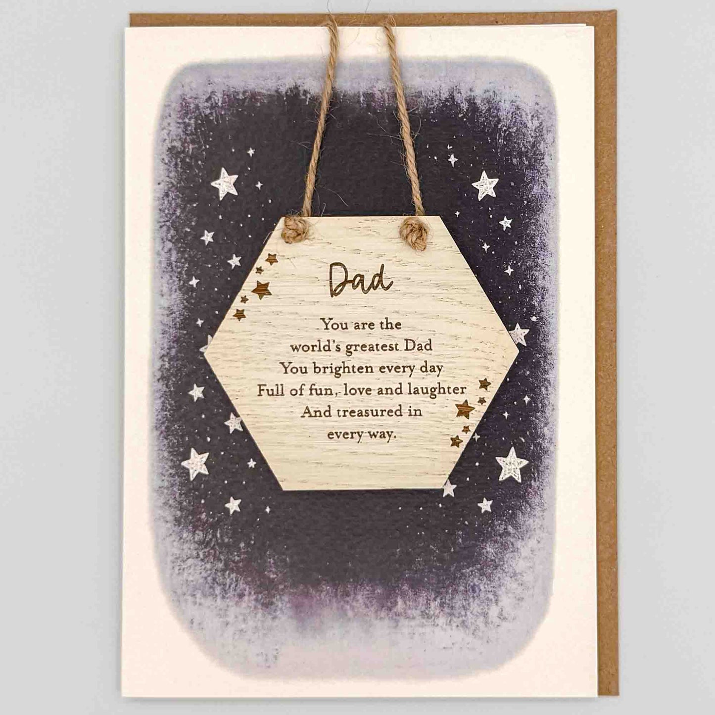 World’s greatest Dad hexagon keepsake card from Sprinkled with Magic, featuring a removable wooden hexagon keepsake, starry navy design and recycled kraft envelope.