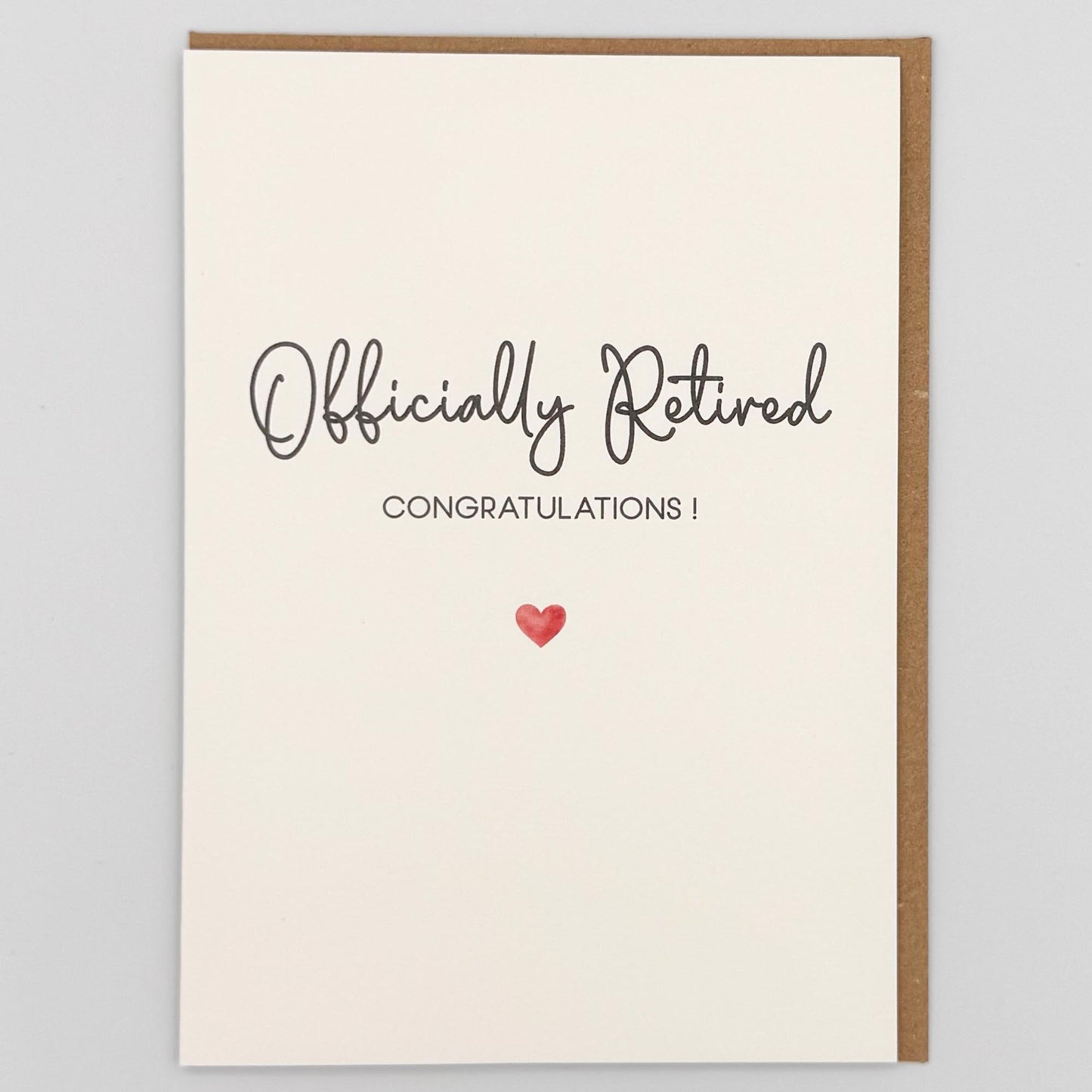 Officially retired card from Sprinkled with Magic, featuring handwritten-style retirement wording, congratulations message, a small red heart and recycled kraft envelope.