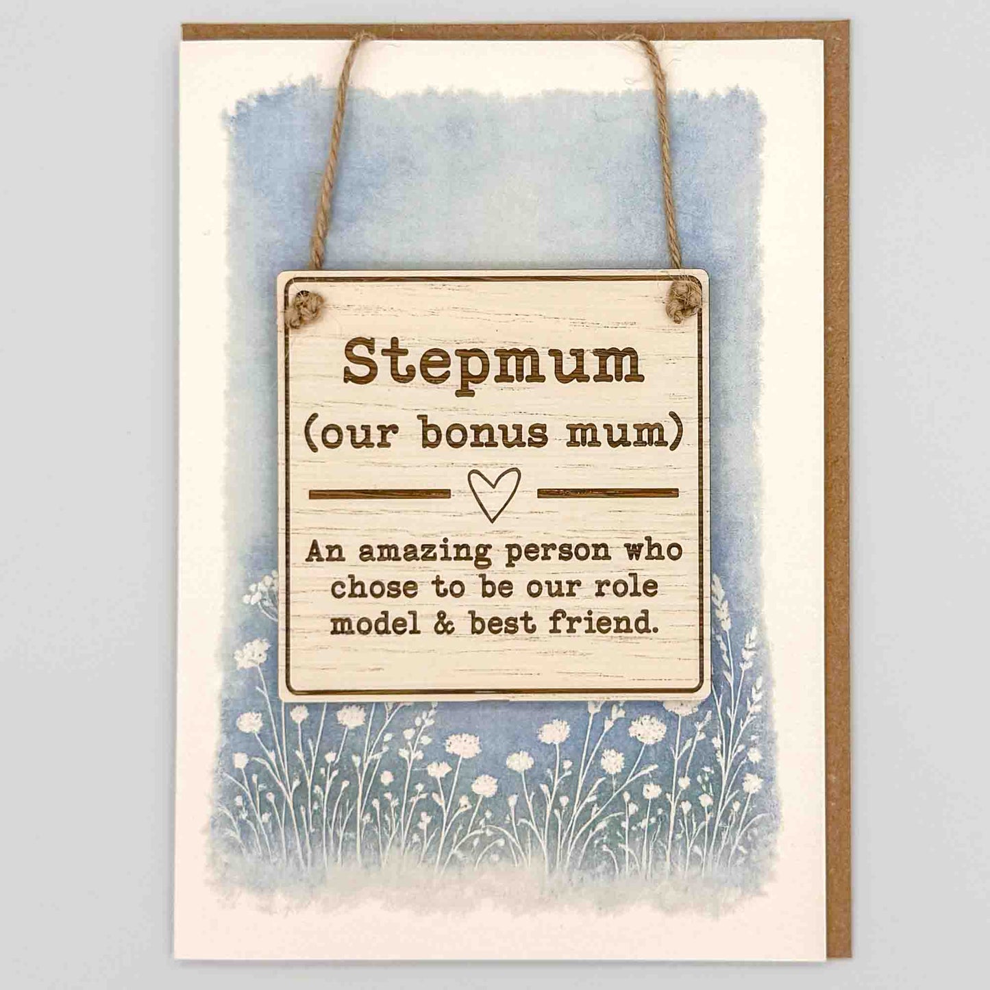 Stepmum square keepsake card from Sprinkled with Magic, featuring a removable wooden bonus mum sign, blue botanical design and recycled kraft envelope.