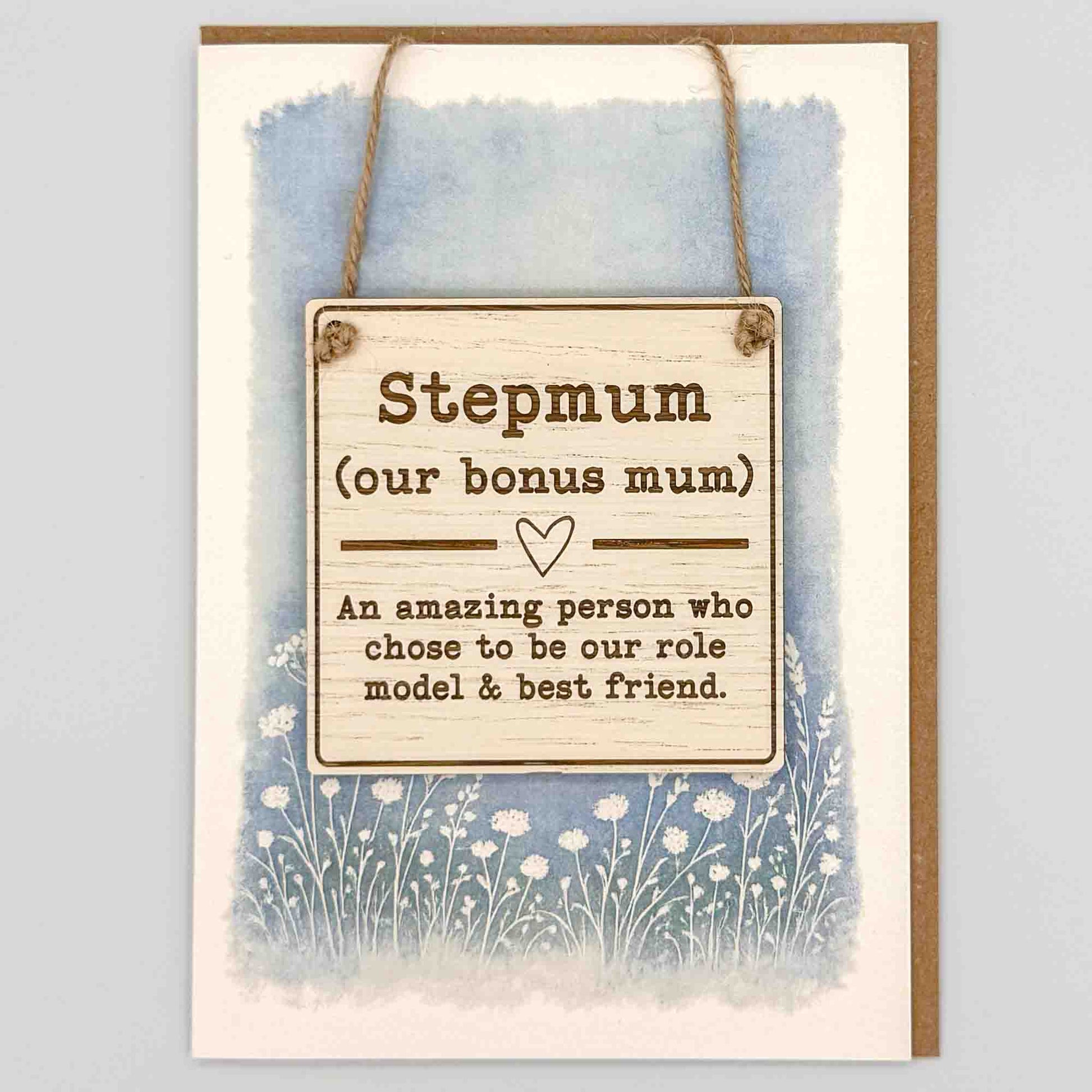 Stepmum square keepsake card from Sprinkled with Magic, featuring a removable wooden bonus mum sign, blue botanical design and recycled kraft envelope.