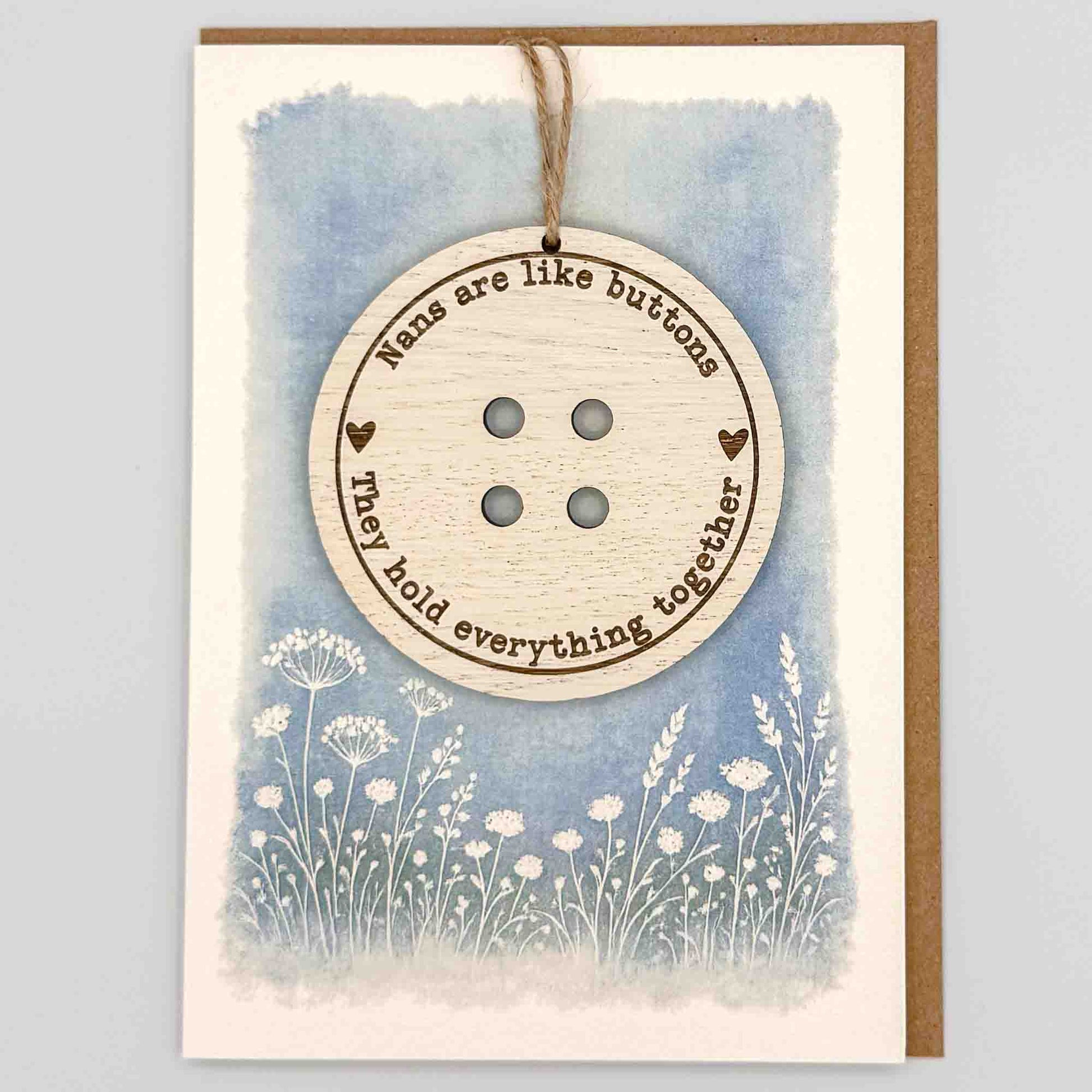 Nans are like buttons keepsake card from Sprinkled with Magic, featuring a removable wooden button keepsake, blue botanical design and recycled kraft envelope.