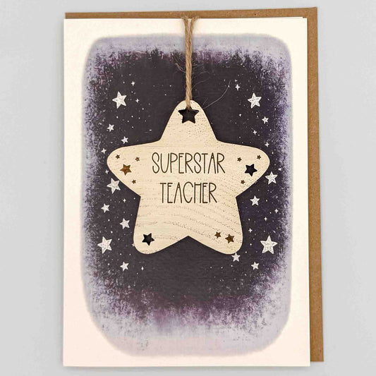 Superstar teacher star keepsake card from Sprinkled with Magic, featuring a removable wooden star keepsake, starry navy design and recycled kraft envelope.