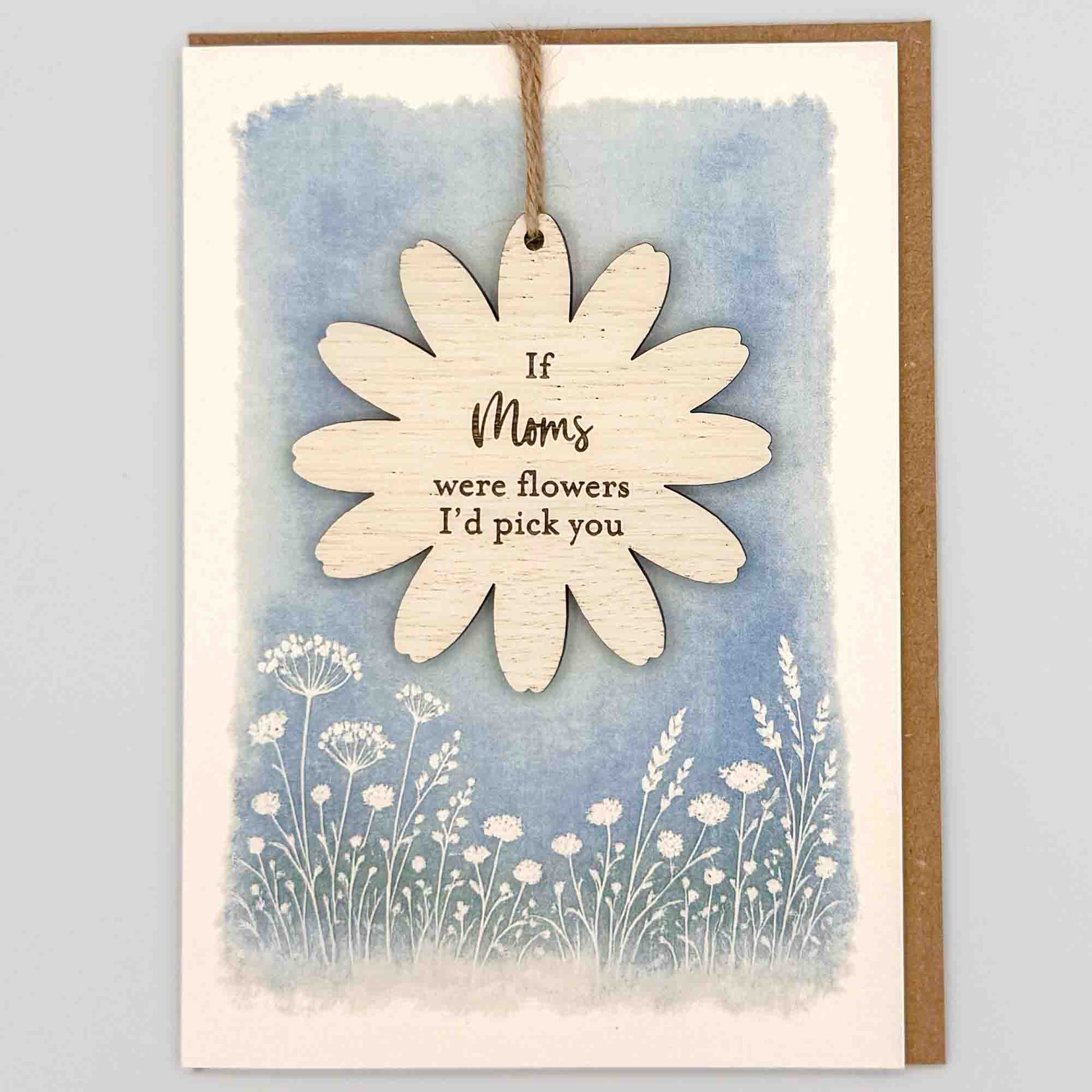 If Moms were flowers keepsake card from Sprinkled with Magic, featuring a removable wooden flower keepsake, blue botanical design and recycled kraft envelope.