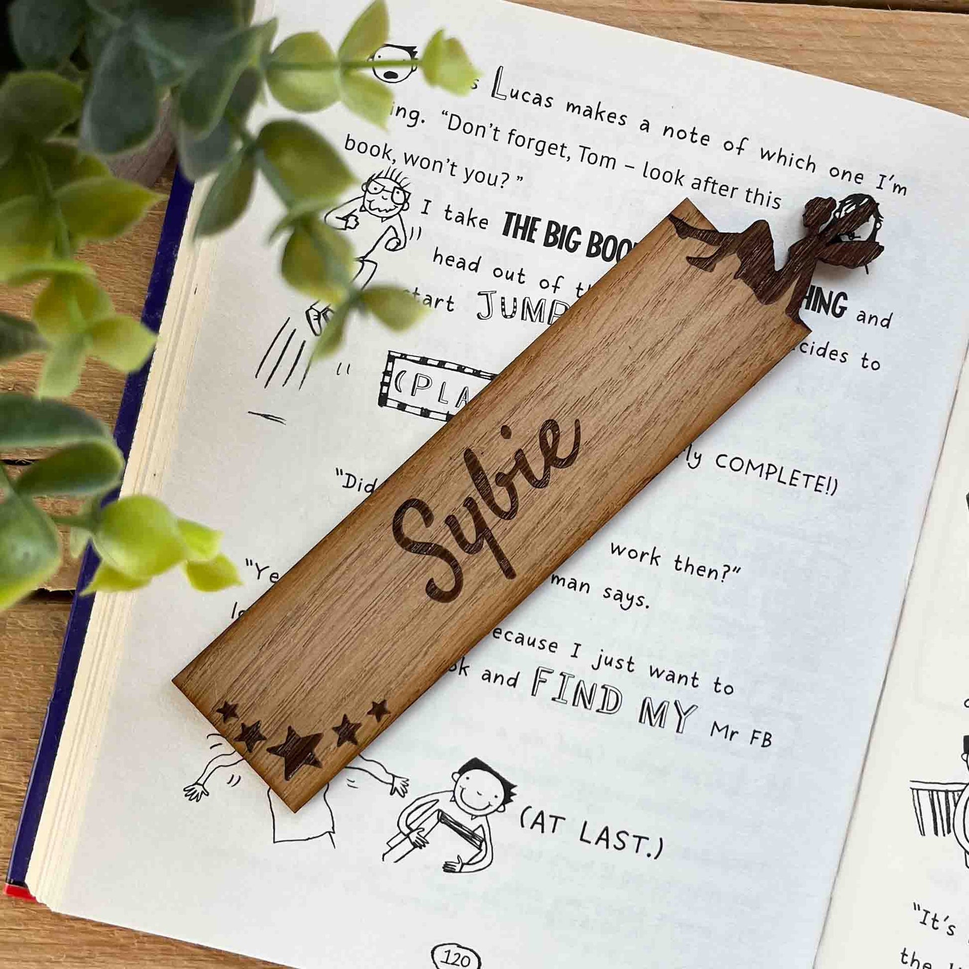 bookmark with fairy sitting at the top personalised with name