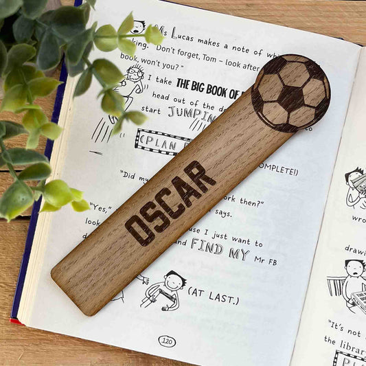 personalised wooden bookmark with engraved football at the end.