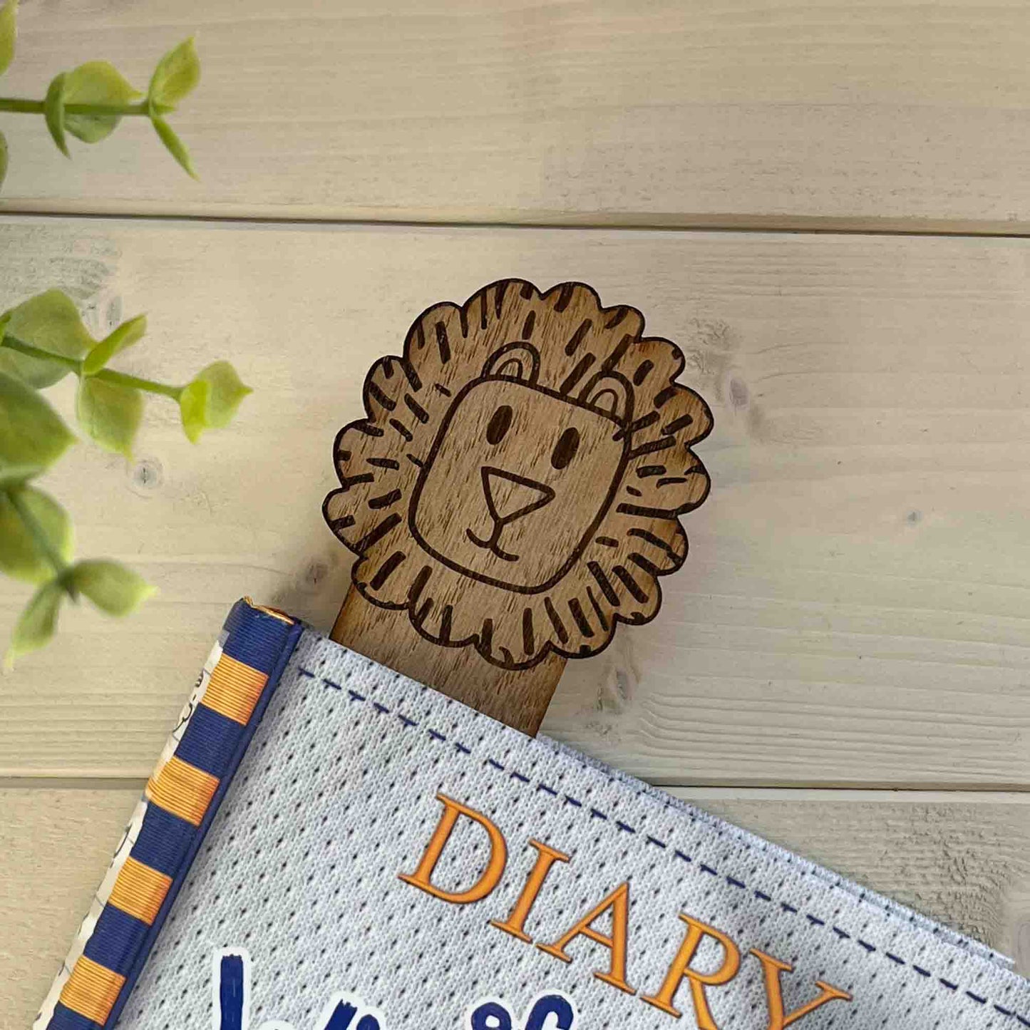 lion bookmark in book